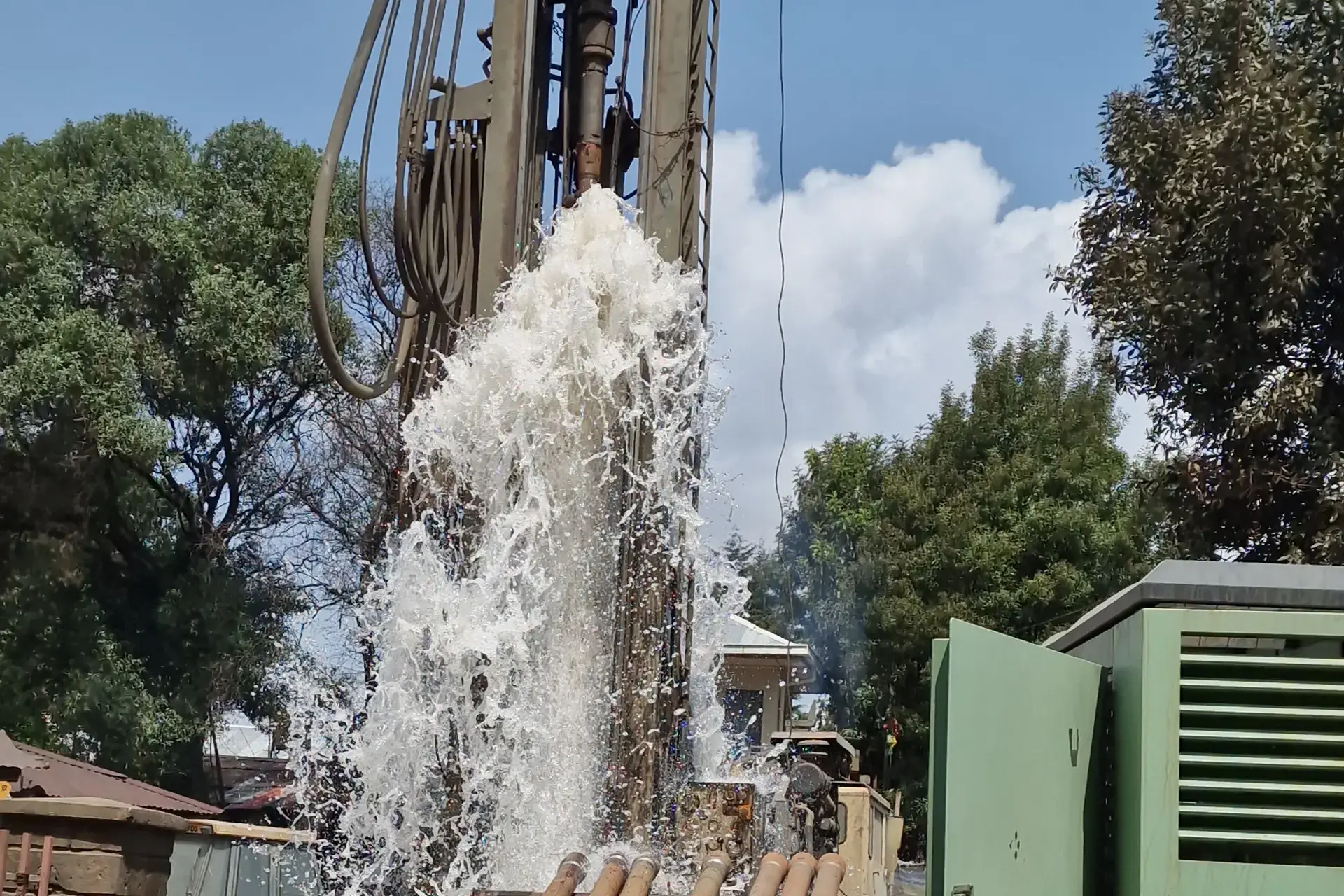 Water rising from the new well during development at Yekatit 12 Medical College